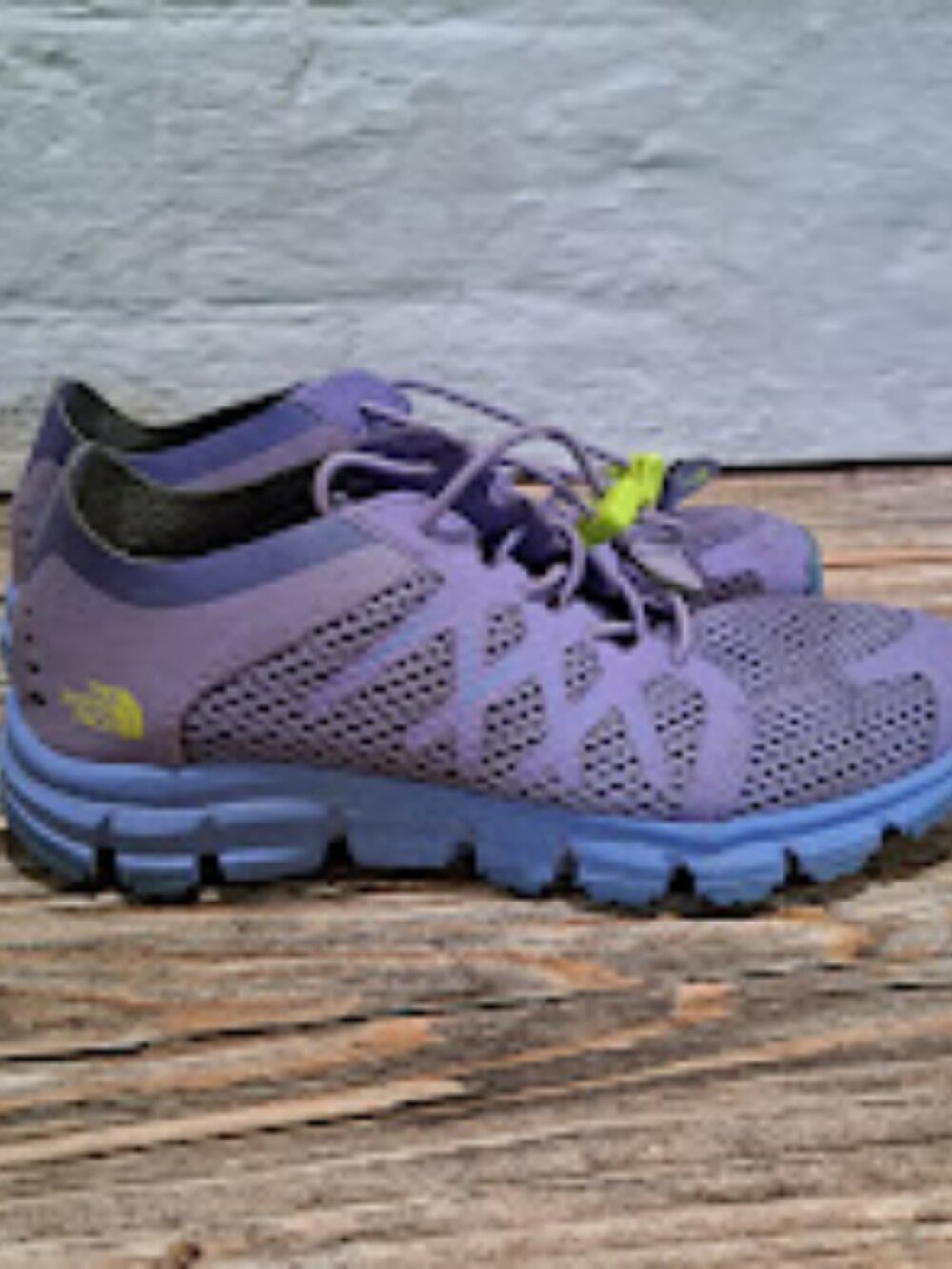 The North Face Litewave Flow Kids' water shoes purple and green with mesh upper